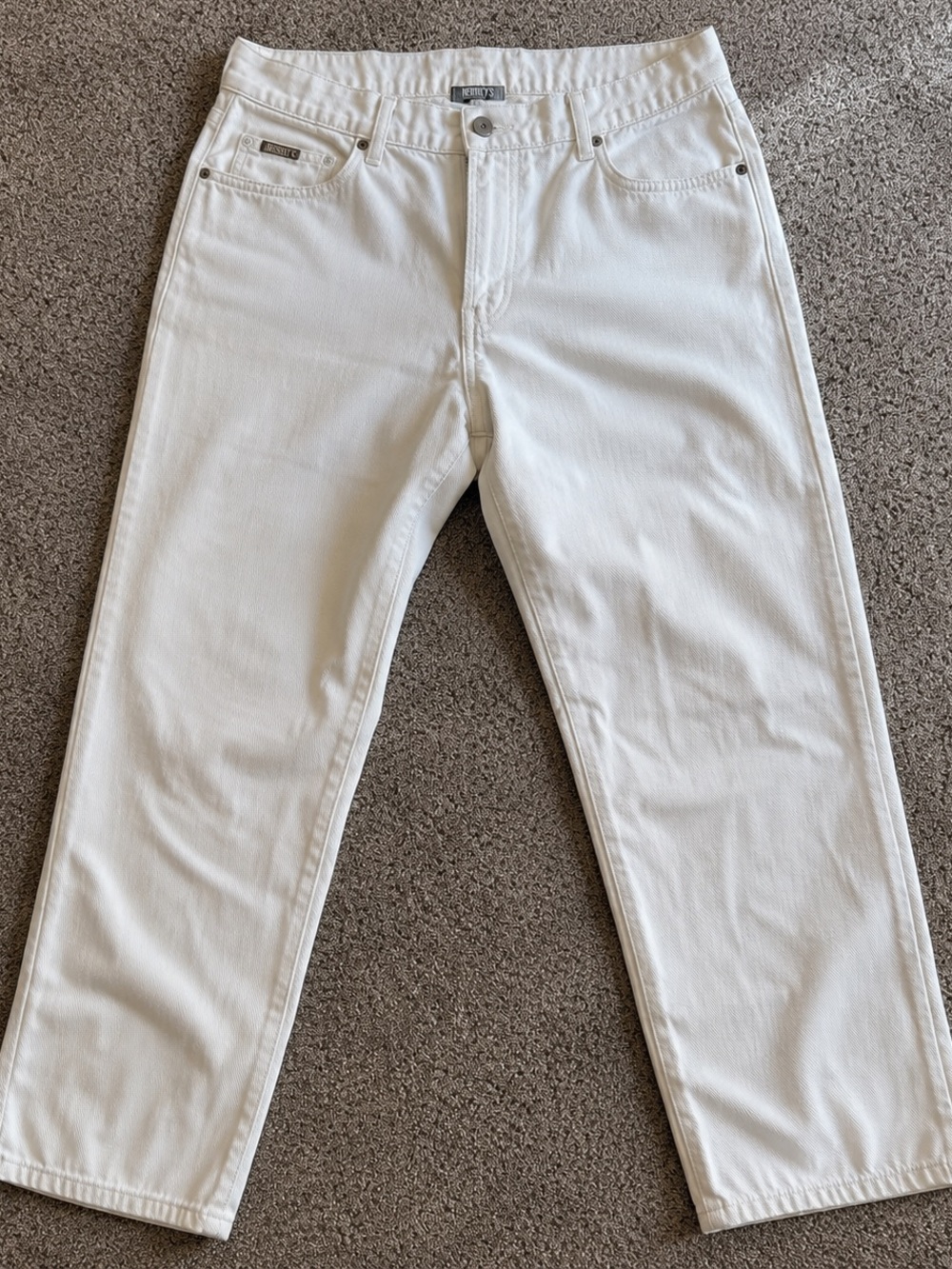 Men’s white Resistol Rodeo Gear denim jeans.